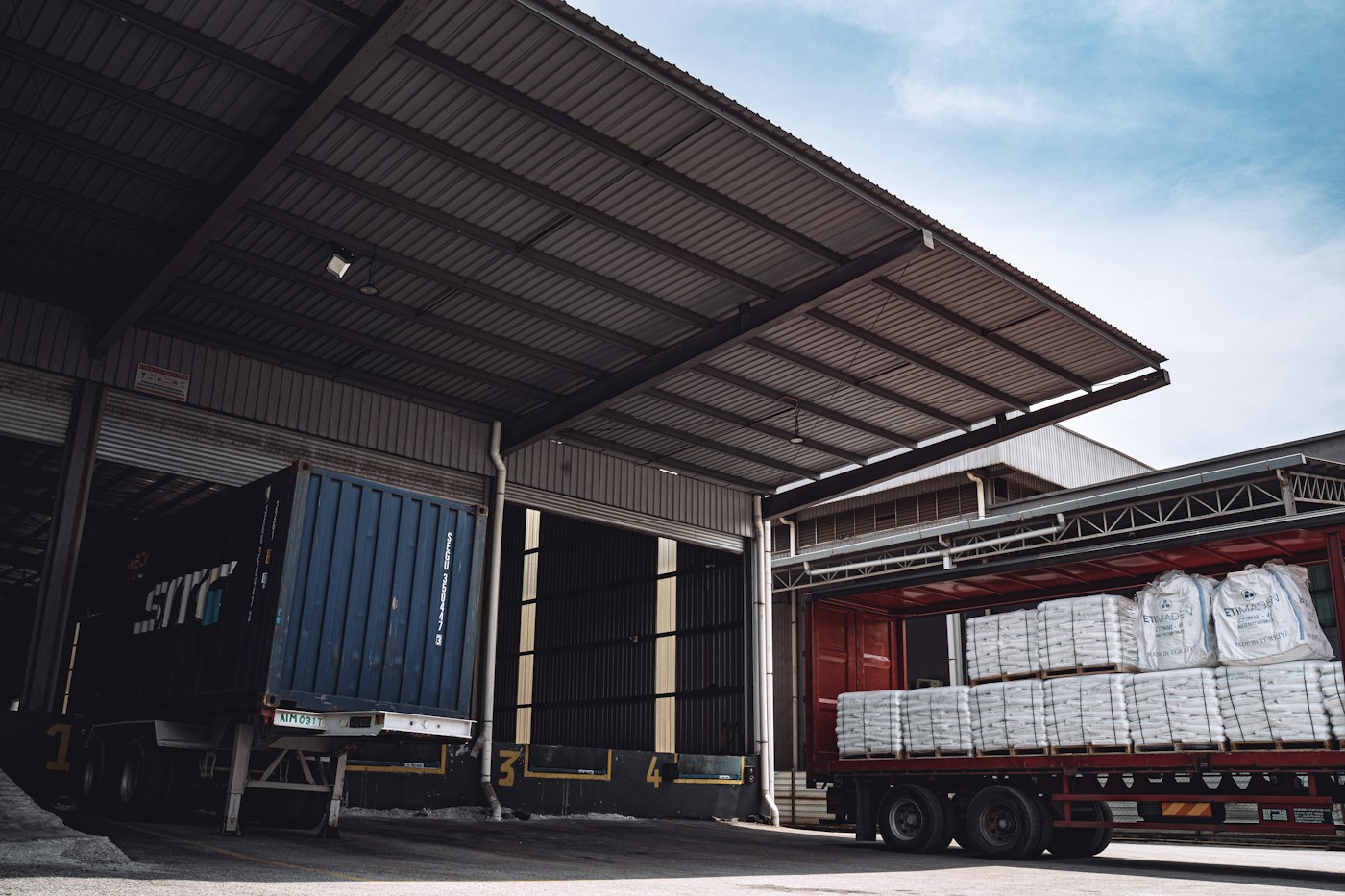 Trailers being loaded at a warehouse dock